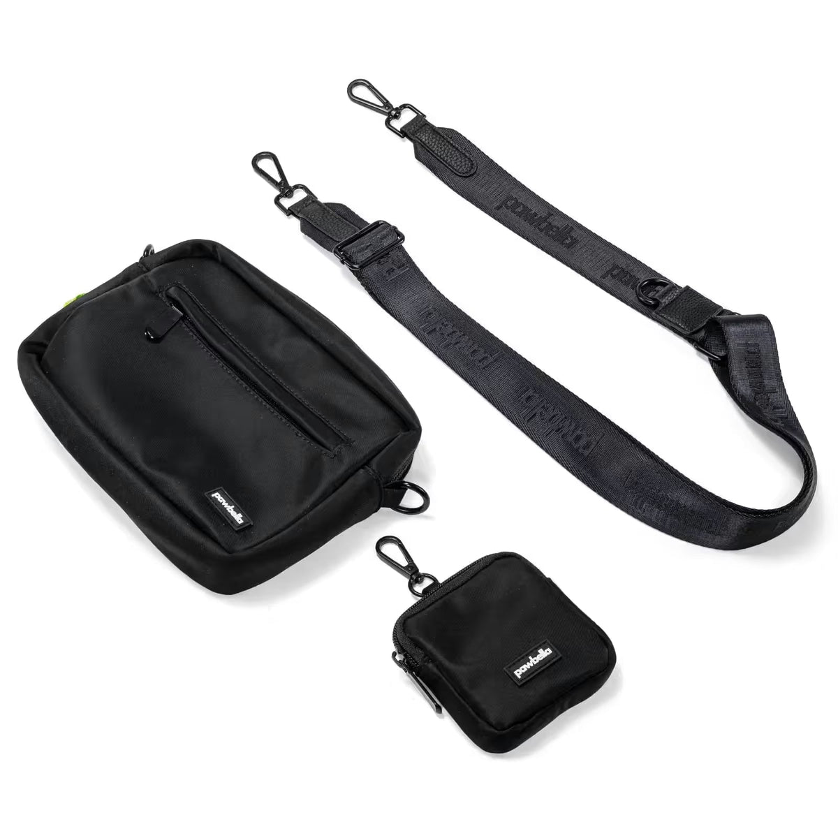 The Pawbella Crossbody Dog Walking Bag set features a black rectangular zip pouch, square clip-on pouch, and adjustable strap with metal clips—all subtly branded and inspired by Australia.